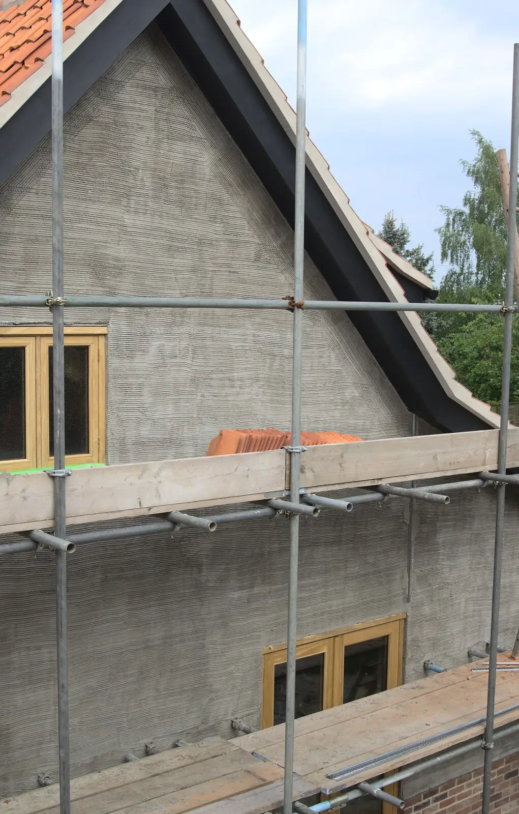 The side extension has a scratch coat of render, from The BBs Play Scrabble at Wingfield Barns, Wingfield, Suffolk - 24th May 2014