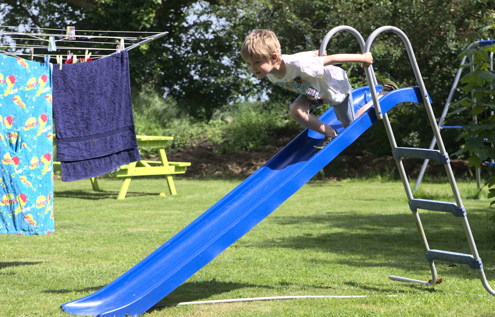 Fred hurls himself off a slide from A "Not a Birthday Party" Barbeque, Brome, Suffolk - 25th May 2014