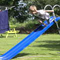 Fred hurls himself off a slide, A "Not a Birthday Party" Barbeque, Brome, Suffolk - 25th May 2014