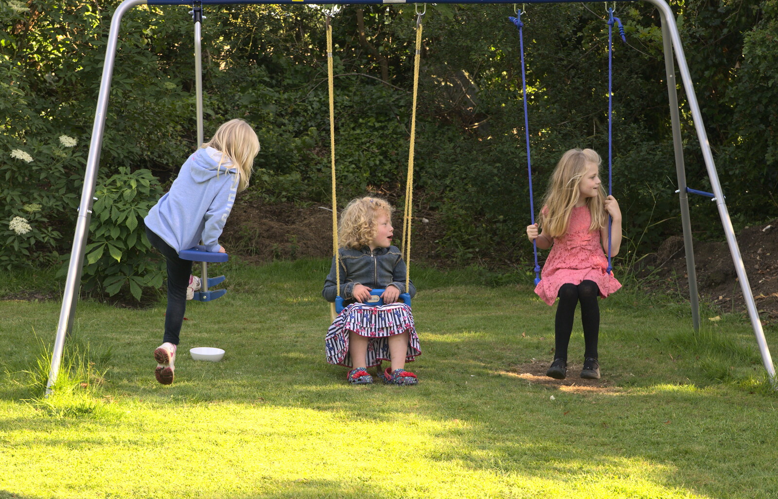 Rosie and Jessica on the swing from A "Not a Birthday Party" Barbeque, Brome, Suffolk - 25th May 2014
