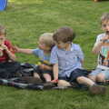 Edward, Harry, Henry and Fred eat lollies, A "Not a Birthday Party" Barbeque, Brome, Suffolk - 25th May 2014