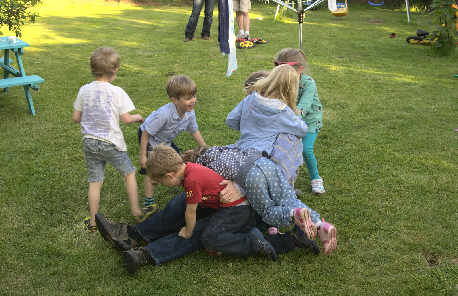 The children all pile onto Mikey P from A "Not a Birthday Party" Barbeque, Brome, Suffolk - 25th May 2014
