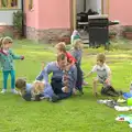 Mike busts out of the sprog pile, A "Not a Birthday Party" Barbeque, Brome, Suffolk - 25th May 2014