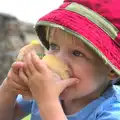 Harry stuffs a sandwich in to his face, A Birthday Trip to the Zoo, Banham, Norfolk - 26th May 2014