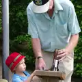 Grandad helps Harry with his passport stamp, A Birthday Trip to the Zoo, Banham, Norfolk - 26th May 2014