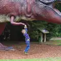 Fred hangs off a Tyrannosaurus Rex, A Birthday Trip to the Zoo, Banham, Norfolk - 26th May 2014