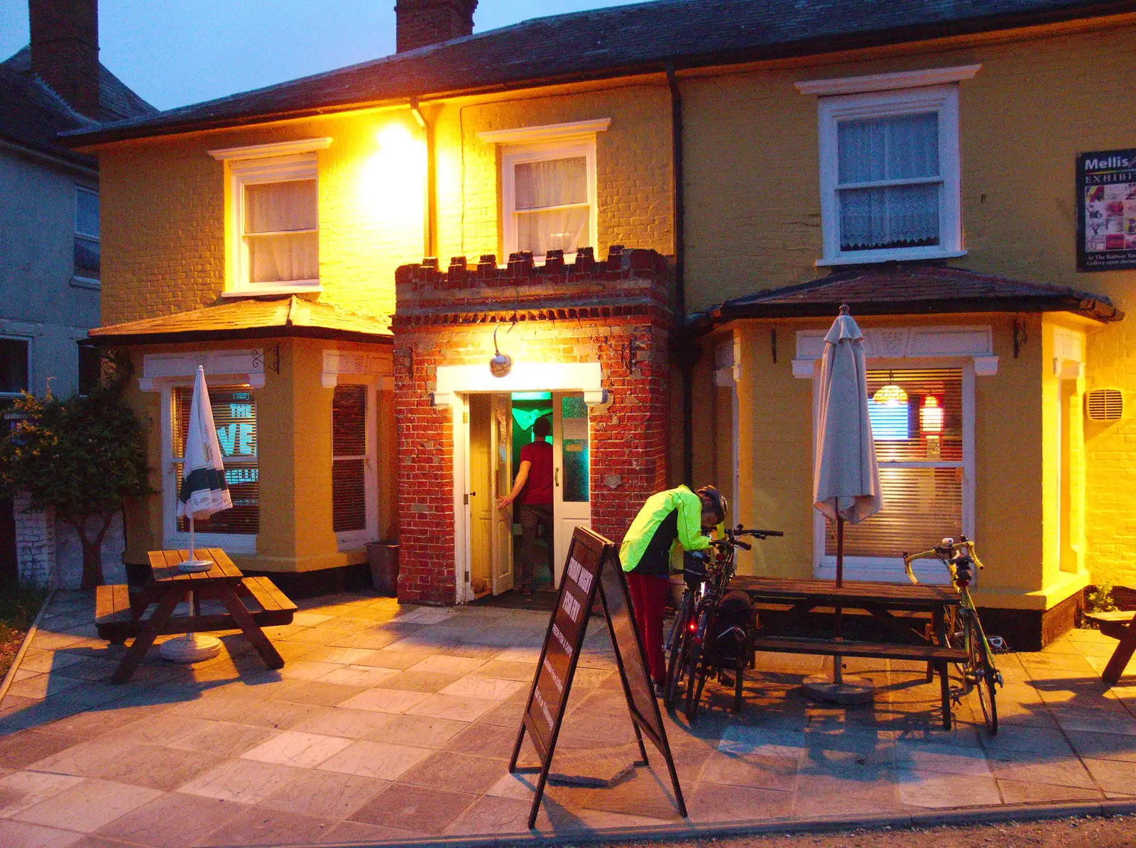 Isobel saddles up outside the Mellis Railway Tavern, from The BSCC at the Railway Tavern, Mellis, Suffolk - 28th May 2014