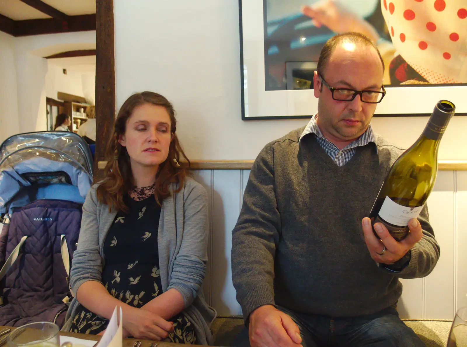 Matt inspects the wine bottle, from Sis and Matt Visit, Suffolk and Norfolk - 31st May 2014