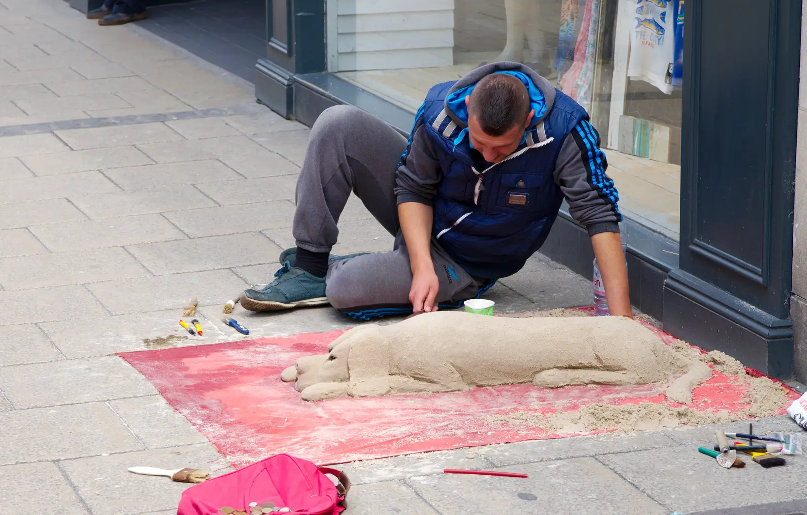 Some dude makes a pavement dog out of sand, from Sis and Matt Visit, Suffolk and Norfolk - 31st May 2014