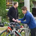 Pippa hangs her bike helmet off the handlebars, The BSCC at the Victoria, Earl Soham, Suffolk - 5th June 2014