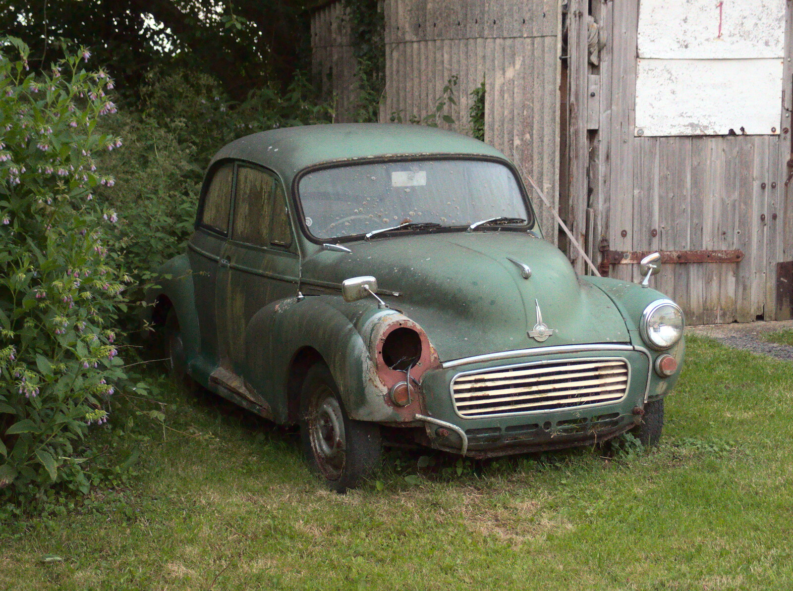 An old Morris Minor merges in to the ground from The BSCC at the Victoria, Earl Soham, Suffolk - 5th June 2014