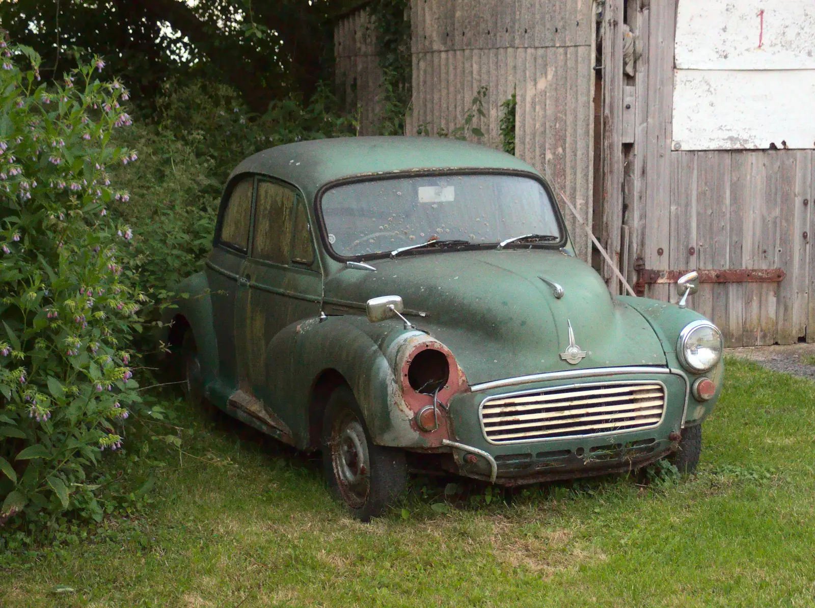 An old Morris Minor merges in to the ground, from The BSCC at the Victoria, Earl Soham, Suffolk - 5th June 2014