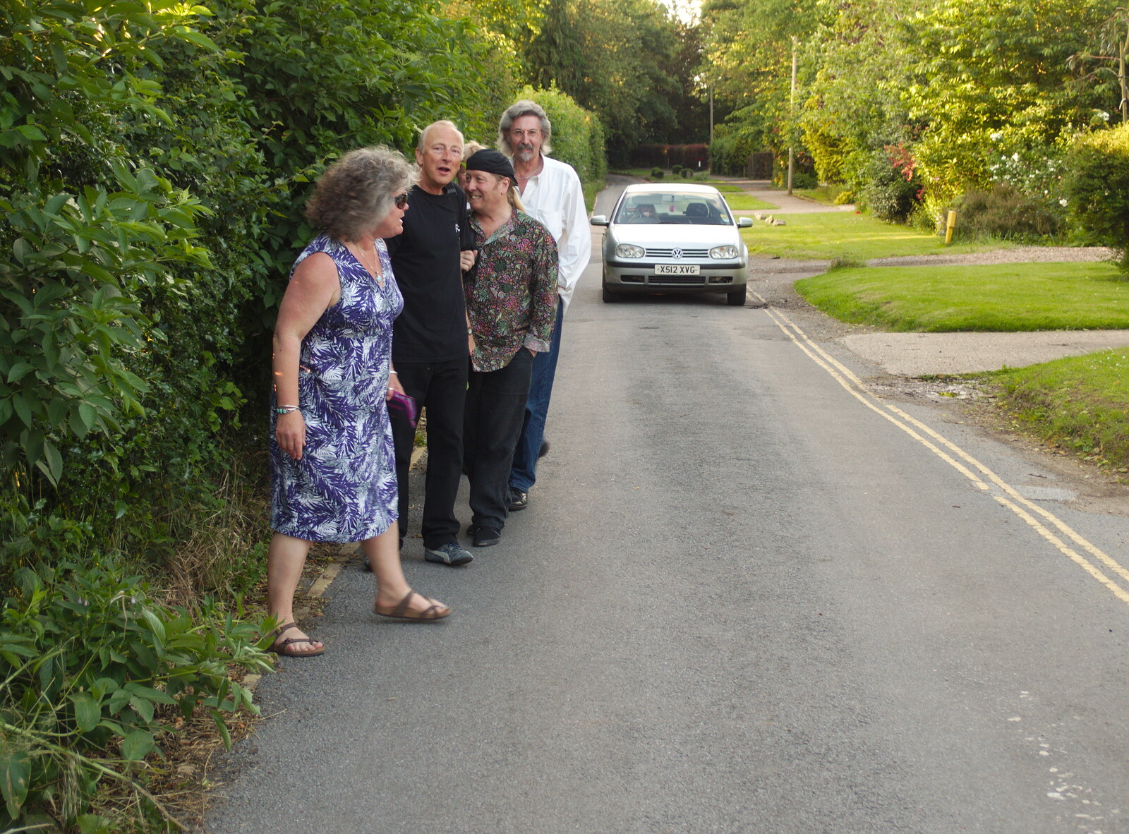 The band hides in the hedge for a passing car from The BBs at Diss Rugby Club, Bellrope Lane, Roydon, Norfolk - 7th June 2014