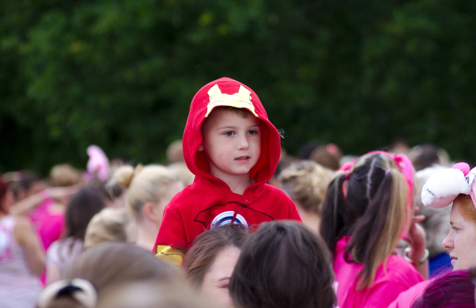 A small boy looks out over the crowd from Isobel's Race For Life, Chantry Park, Ipswich - 11th June 2014
