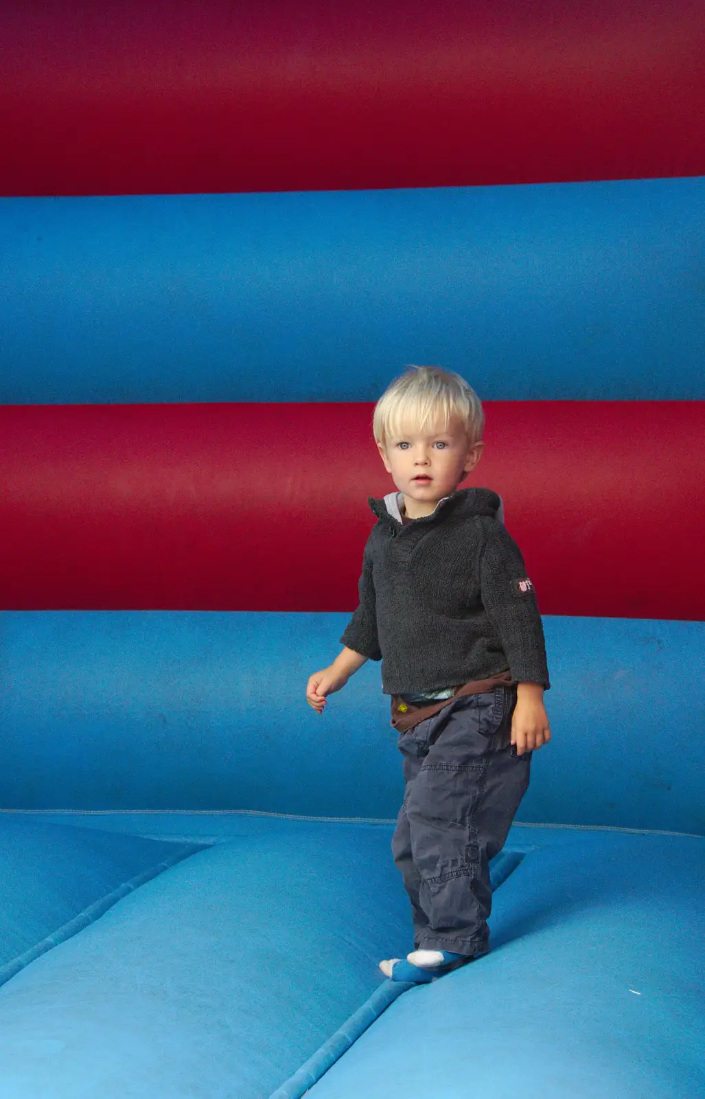 Harry bounces around on a Bouncy Castle, from Isobel's Race For Life, Chantry Park, Ipswich - 11th June 2014