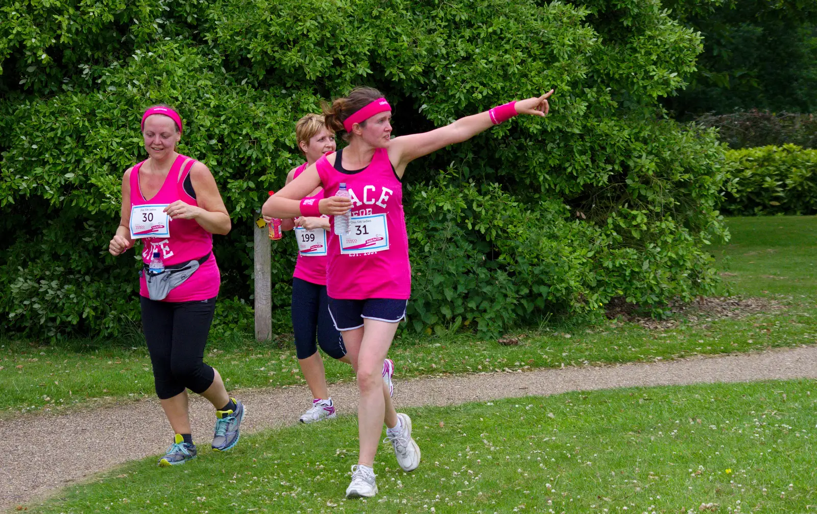 Isobel points to Fred in a tree, from Isobel's Race For Life, Chantry Park, Ipswich - 11th June 2014