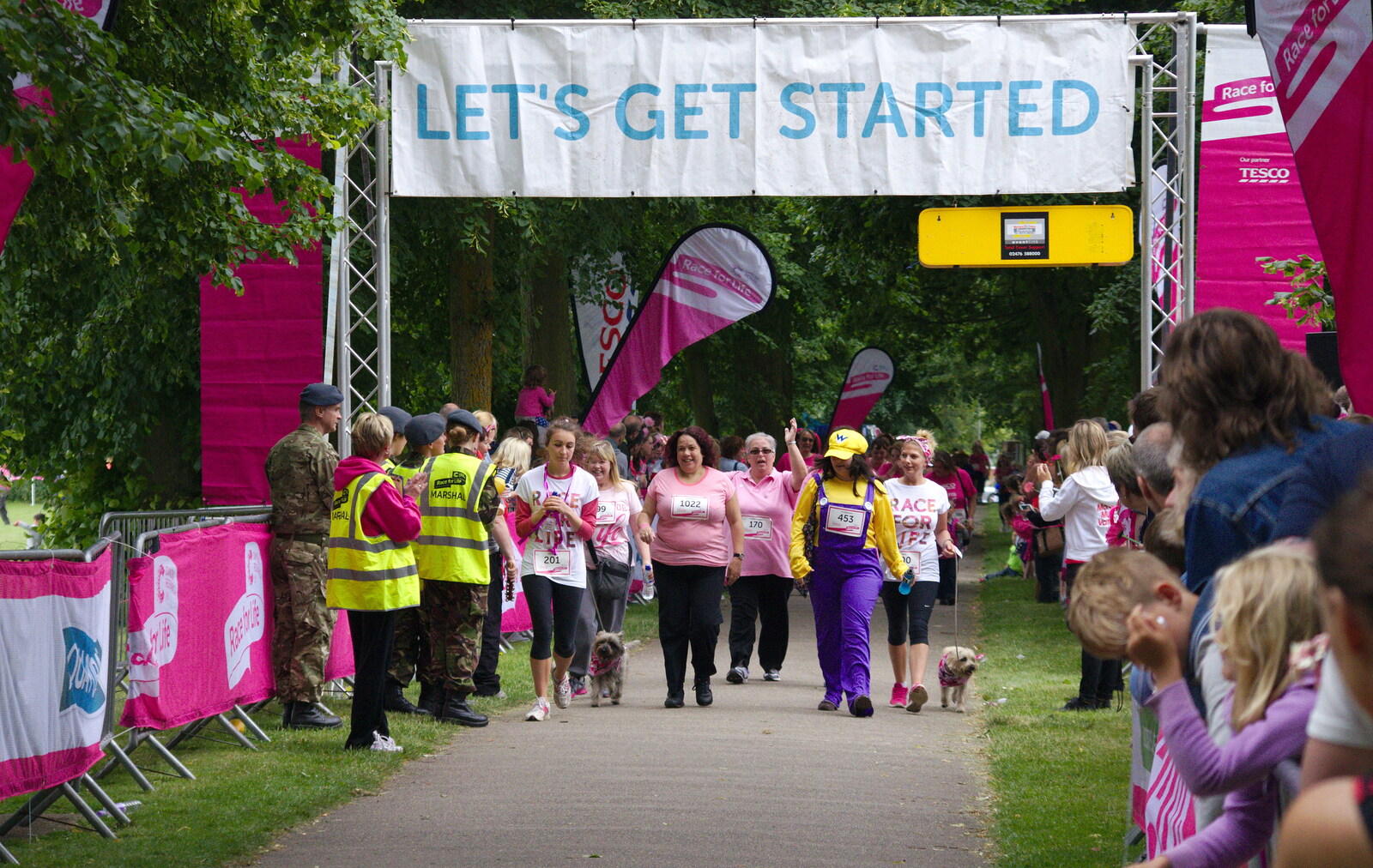 Walkers at the finish line from Isobel's Race For Life, Chantry Park, Ipswich - 11th June 2014
