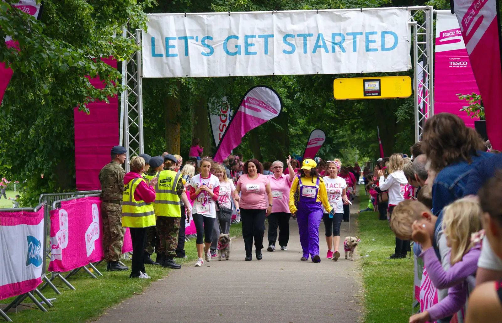 Walkers at the finish line, from Isobel's Race For Life, Chantry Park, Ipswich - 11th June 2014