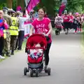 A buggy is pushed around, Isobel's Race For Life, Chantry Park, Ipswich - 11th June 2014