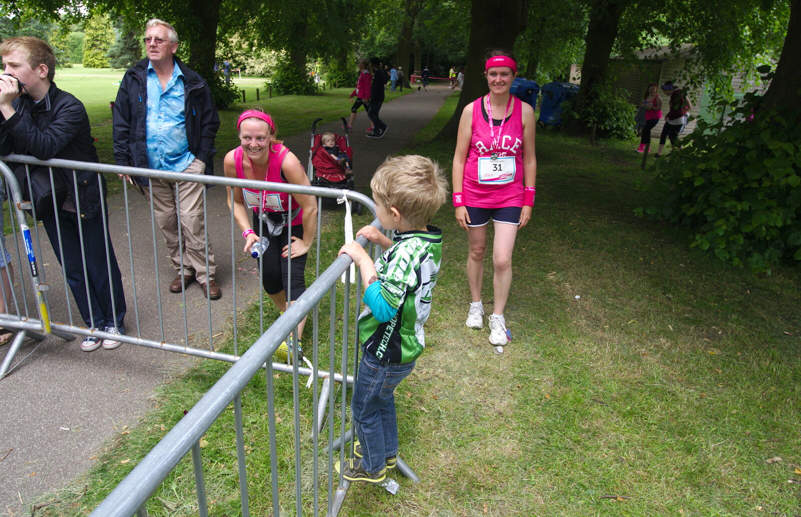 Fred climbs on a railing from Isobel's Race For Life, Chantry Park, Ipswich - 11th June 2014