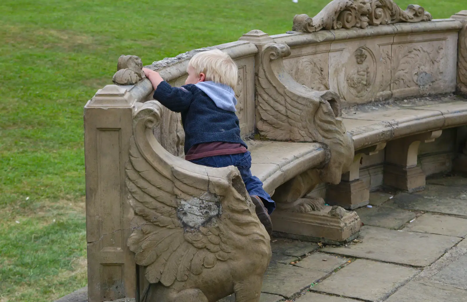 Harry climbs on a stone bench, from Isobel's Race For Life, Chantry Park, Ipswich - 11th June 2014