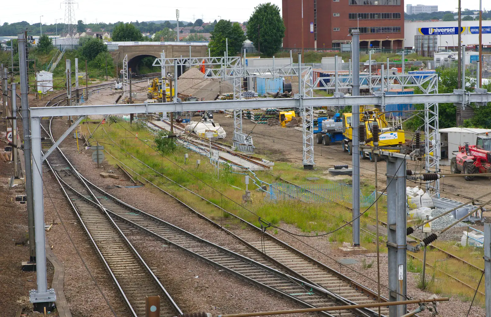 New overhead line gantries are being installed, from Isobel's Race For Life, Chantry Park, Ipswich - 11th June 2014