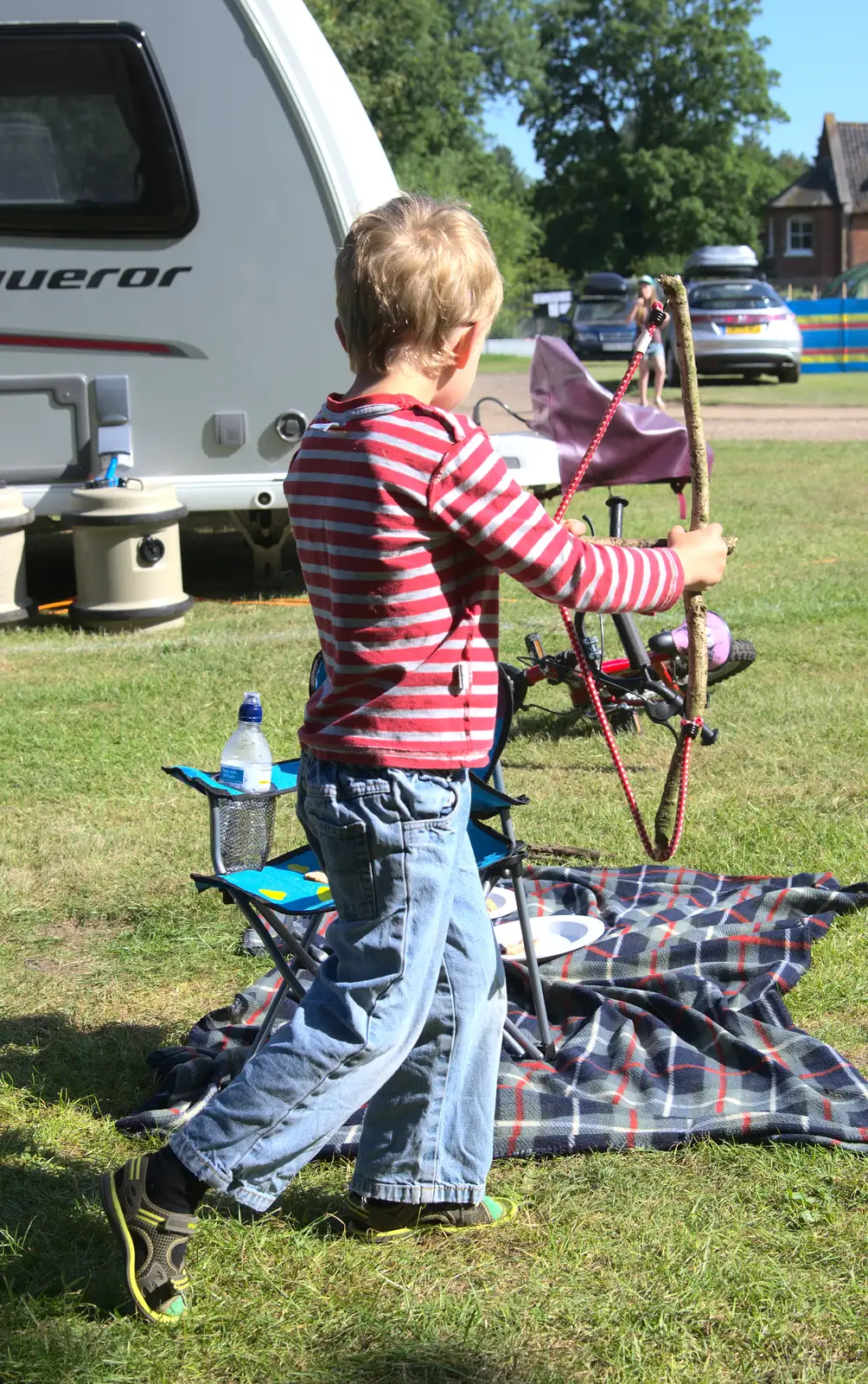 Fred roams around with a home-made bow and arrow, from A Weekend in the Camper Van, West Harling, Norfolk - 21st June 2014