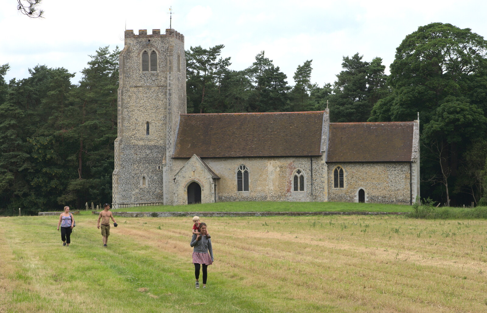 Isobel and Harry wander across the field from A Weekend in the Camper Van, West Harling, Norfolk - 21st June 2014
