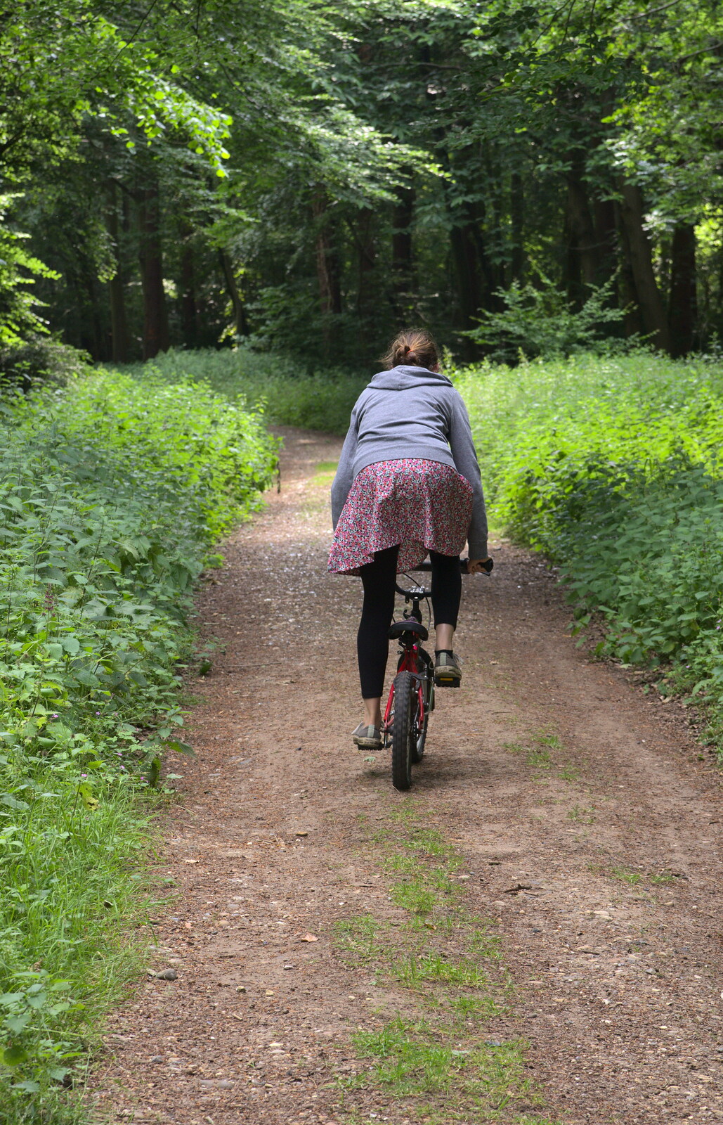 Isobel heads off on Fred's bike from A Weekend in the Camper Van, West Harling, Norfolk - 21st June 2014