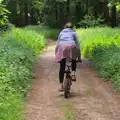 Isobel heads off on Fred's bike, A Weekend in the Camper Van, West Harling, Norfolk - 21st June 2014