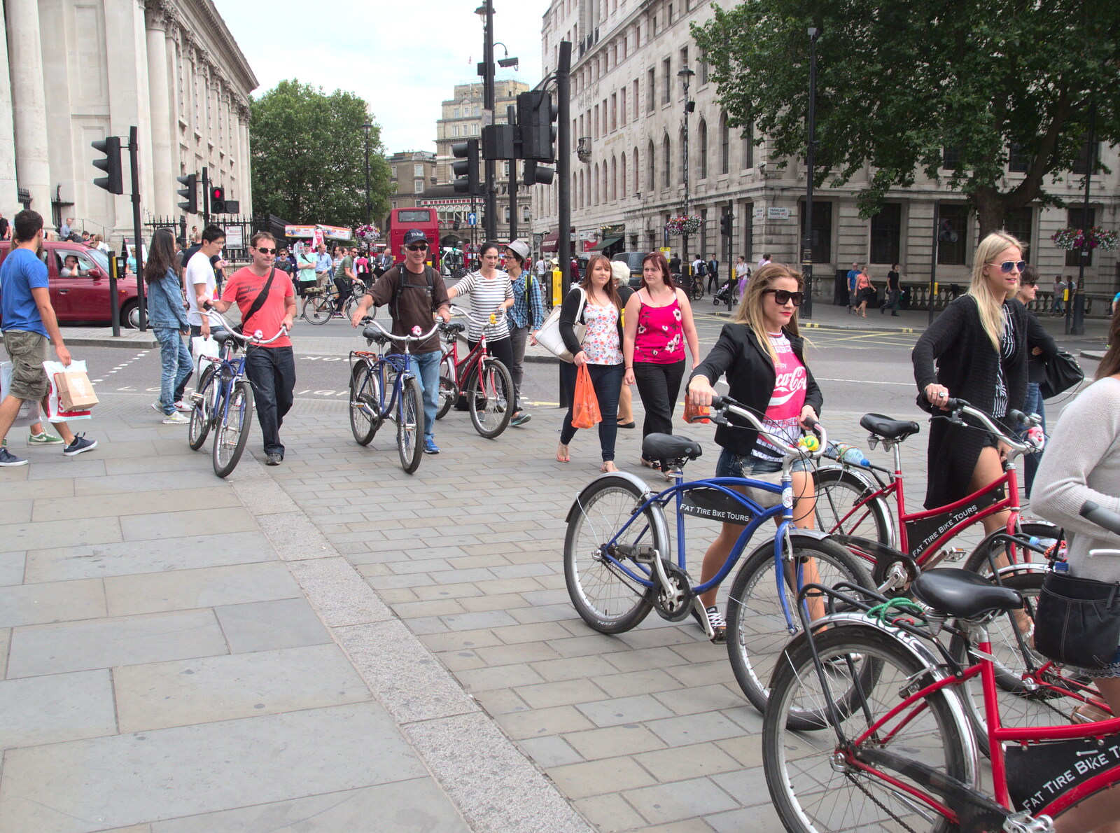 A bike-tour group passes through Trafalgar Square from SwiftKey Innovation Days, The Haymarket, London - 27th June 2014