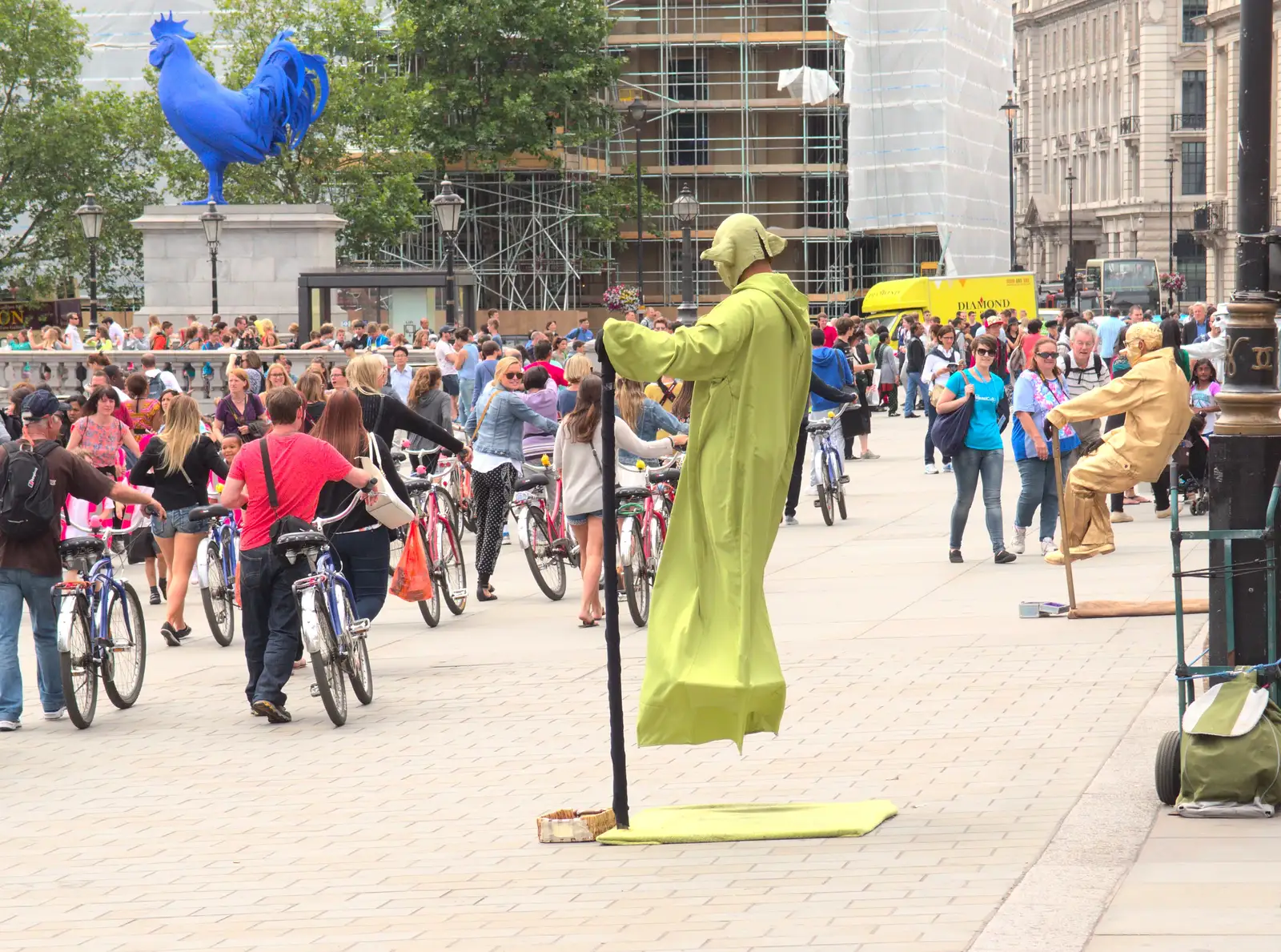 A 'Fat Tire' tour group passes a floating Yoda, from SwiftKey Innovation Days, The Haymarket, London - 27th June 2014