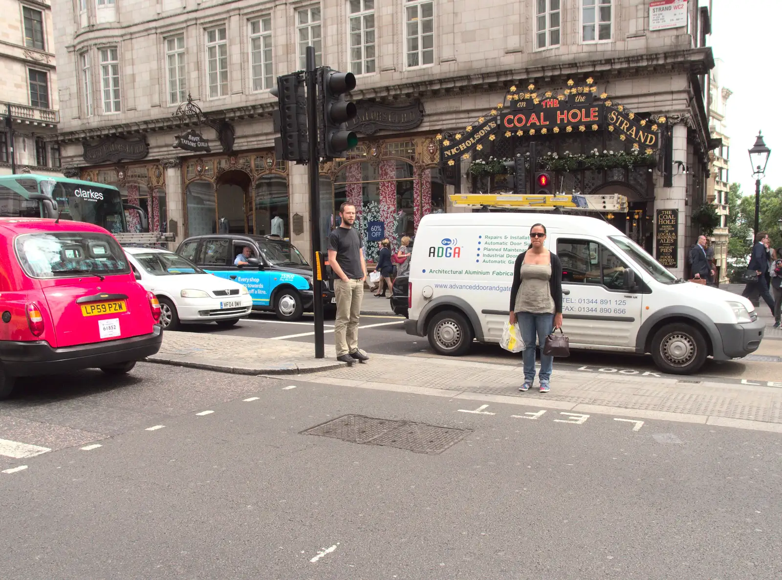 Błażej on a traffic island on The Strand, from SwiftKey Innovation Days, The Haymarket, London - 27th June 2014