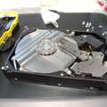 Nosher starts to dis-assemble a 750G hard drive, SwiftKey Innovation Days, The Haymarket, London - 27th June 2014
