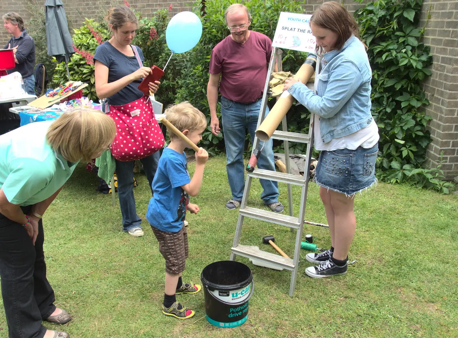 Fred has a go at rat splatting, from A Busy Day and a Church Fair, Diss, Norfolk - 28th June 2014