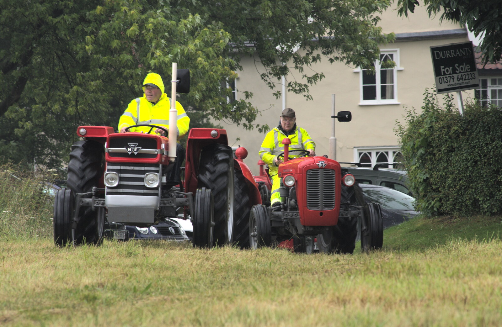 The first of the vintage tractors arrives from Thrandeston Pig, Little Green, Thrandeston, Suffolk - 29th June 2014