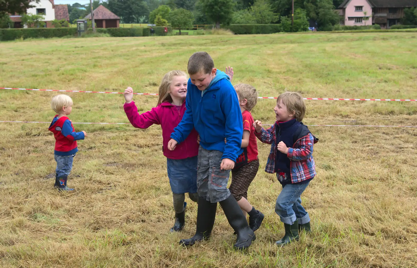 The children mess around on the green, from Thrandeston Pig, Little Green, Thrandeston, Suffolk - 29th June 2014