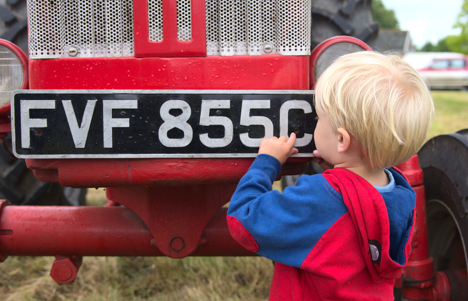 Harry plays with a number plate from Thrandeston Pig, Little Green, Thrandeston, Suffolk - 29th June 2014