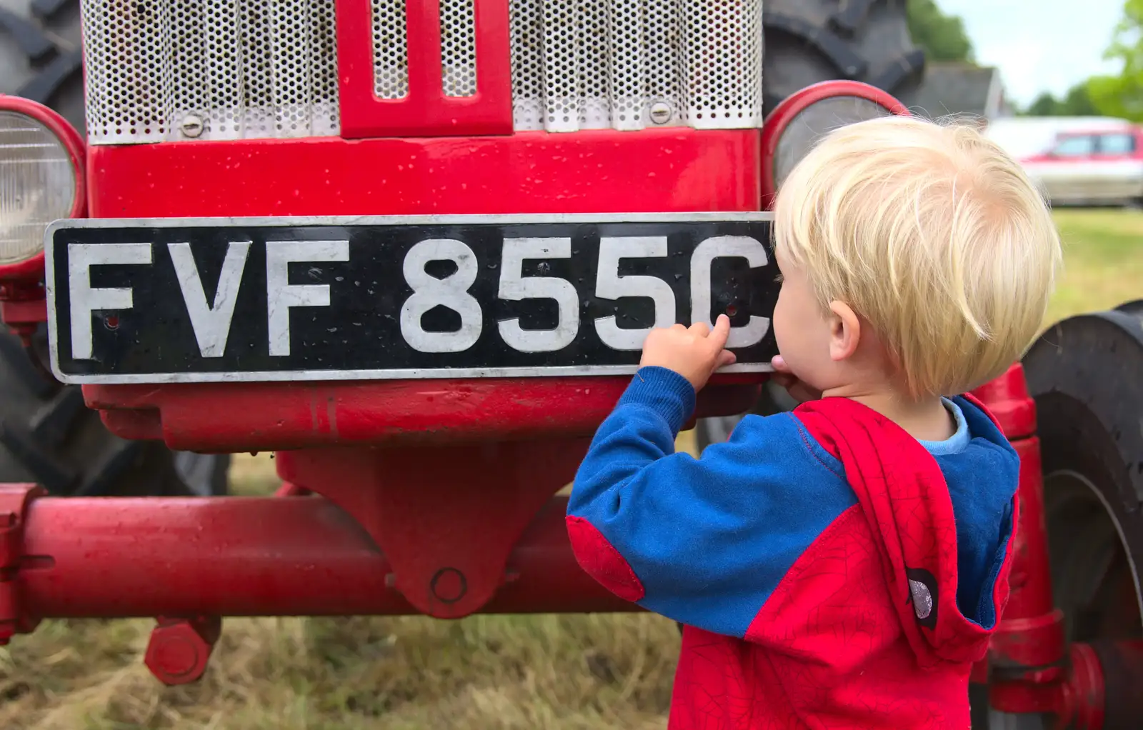 Harry plays with a number plate, from Thrandeston Pig, Little Green, Thrandeston, Suffolk - 29th June 2014