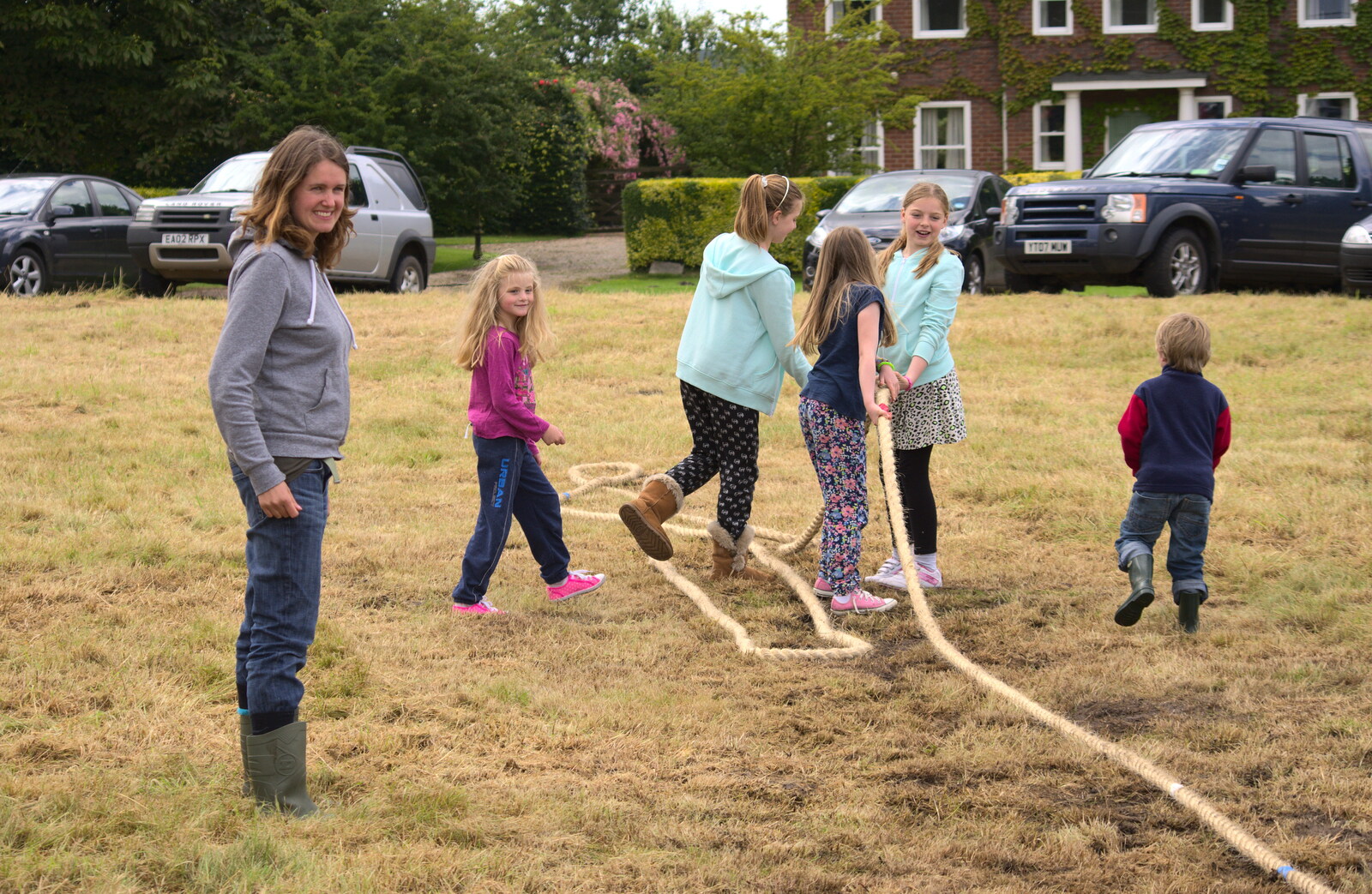 Isobel rounds up a girls team from Thrandeston Pig, Little Green, Thrandeston, Suffolk - 29th June 2014