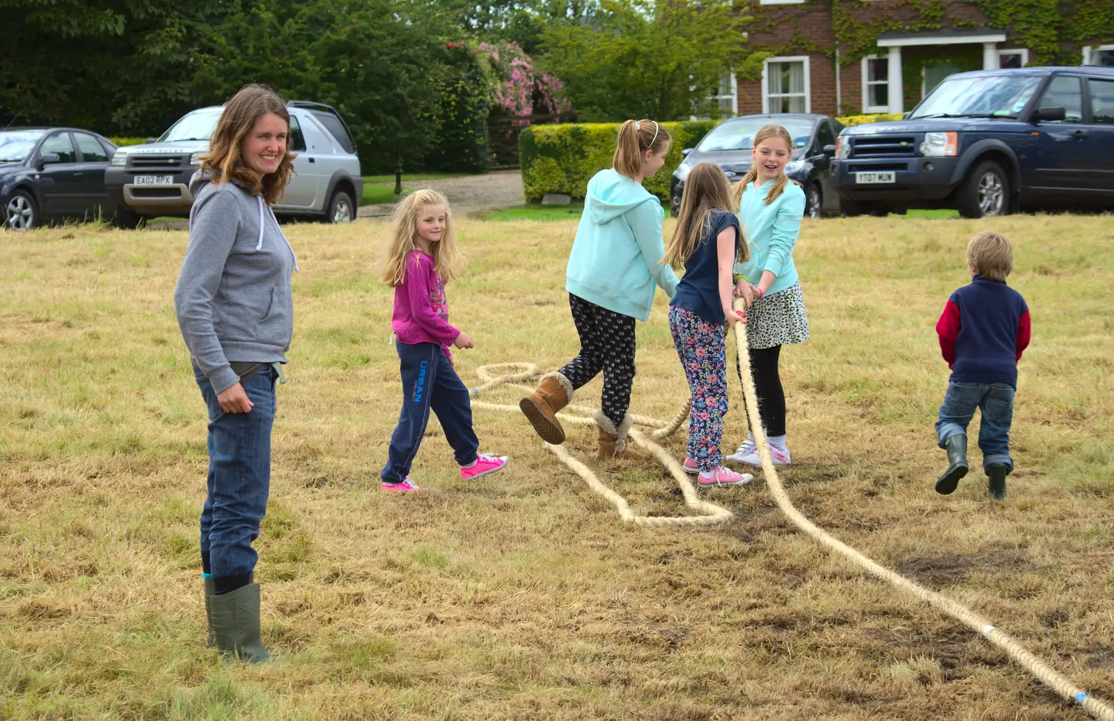 Isobel rounds up a girls team, from Thrandeston Pig, Little Green, Thrandeston, Suffolk - 29th June 2014