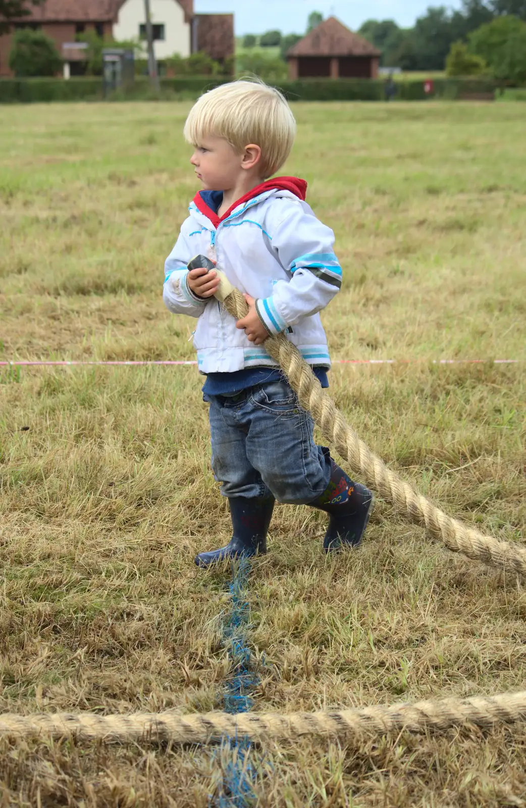 Harry wanders off with rope in hand, from Thrandeston Pig, Little Green, Thrandeston, Suffolk - 29th June 2014