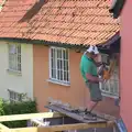 Andrew cuts out the old window, The Village Summer Fête, Brome, Suffolk - 5th July 2014