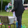 The Rev pokes a tin bath with a stick, The Village Summer Fête, Brome, Suffolk - 5th July 2014