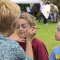 Fred gets face painting as Harry looks on, The Village Summer Fête, Brome, Suffolk - 5th July 2014