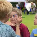 Fred gets face painting as Harry looks on, The Village Summer Fête, Brome, Suffolk - 5th July 2014