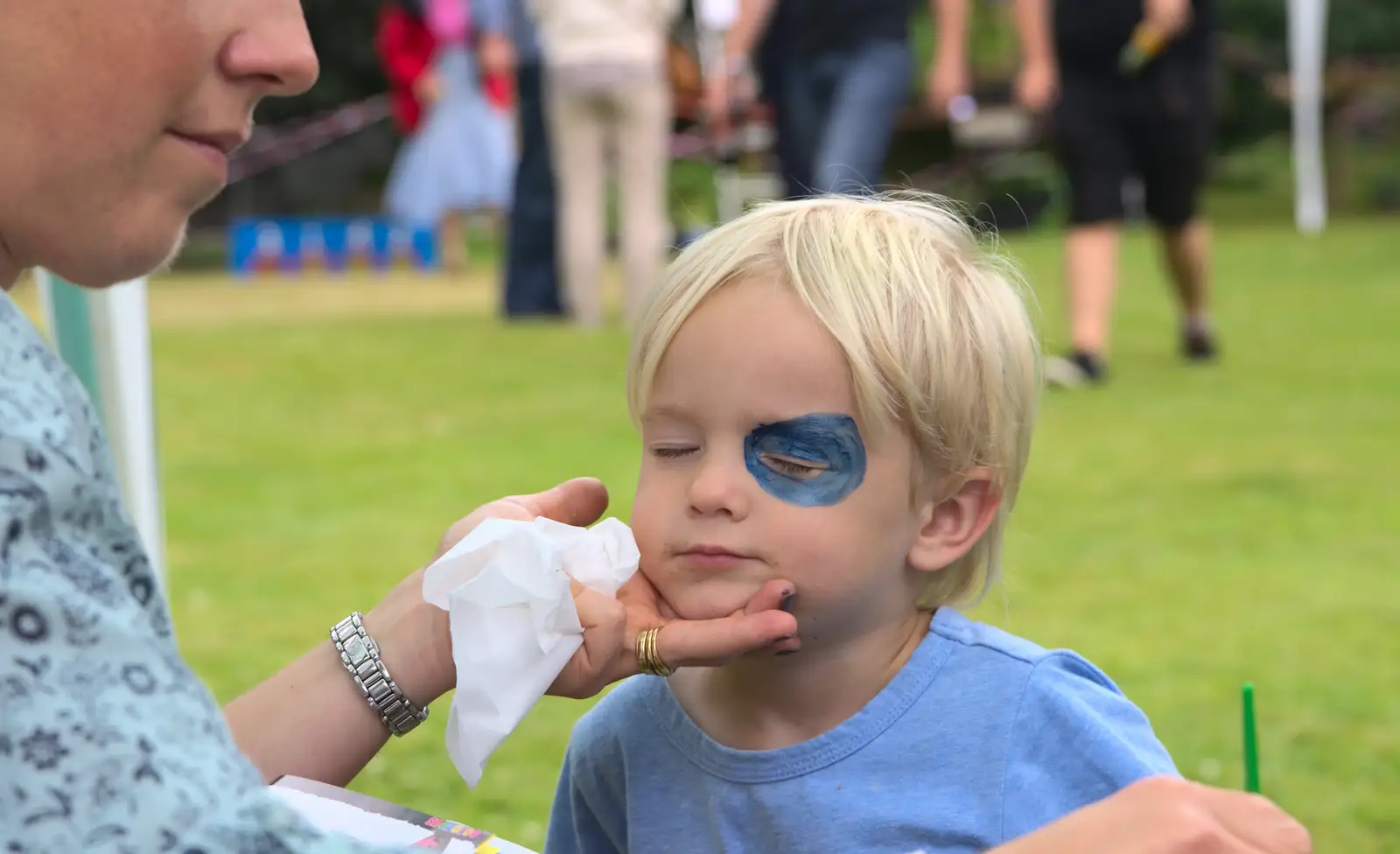 Harry gets the face paint treatment too, from The Village Summer Fête, Brome, Suffolk - 5th July 2014