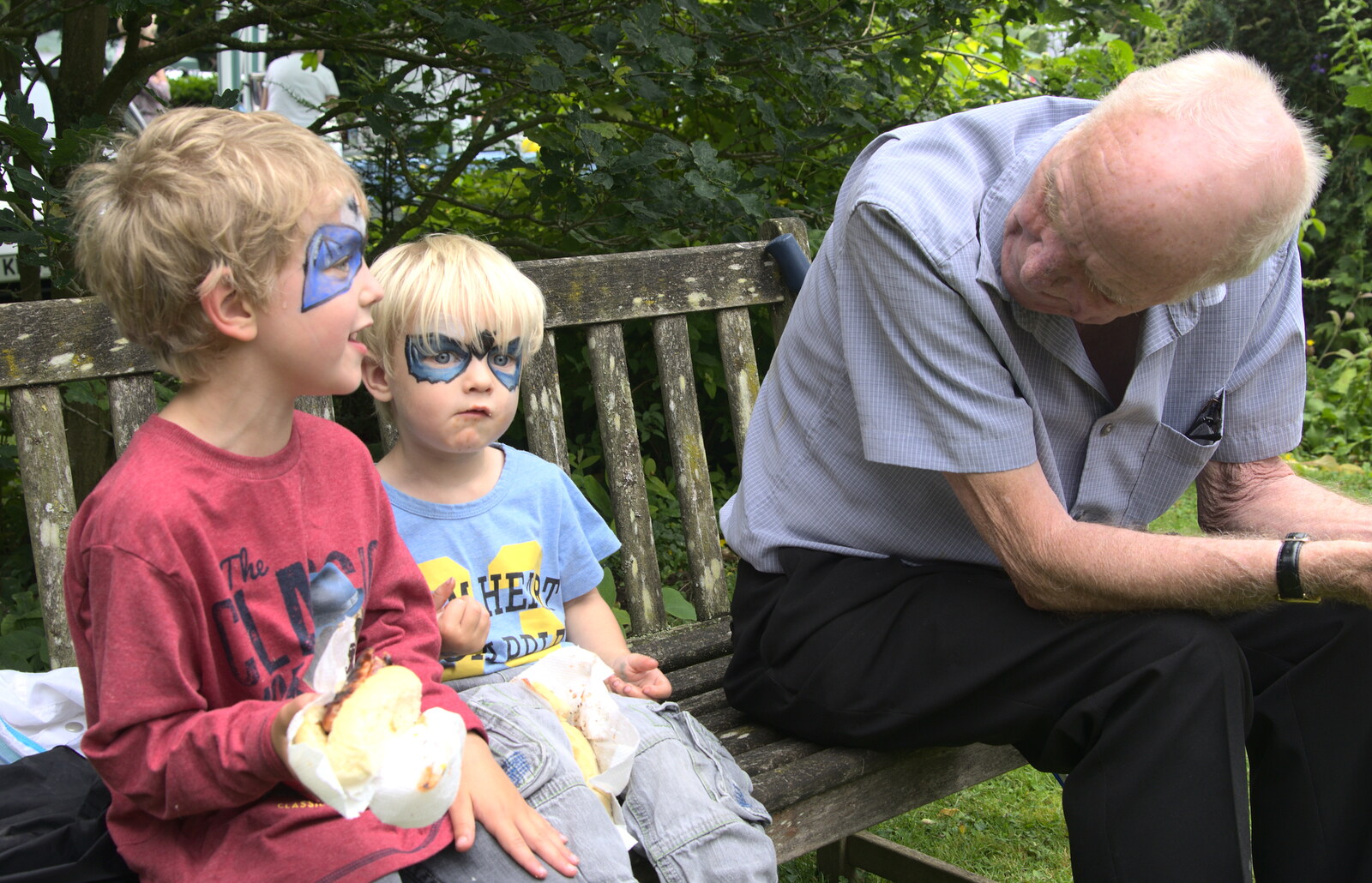 The boys eat sausage with Grandad from The Village Summer Fête, Brome, Suffolk - 5th July 2014