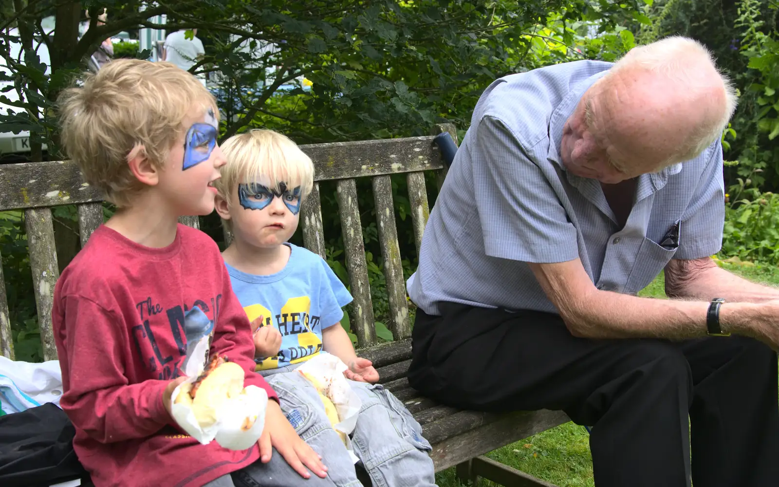 The boys eat sausage with Grandad, from The Village Summer Fête, Brome, Suffolk - 5th July 2014