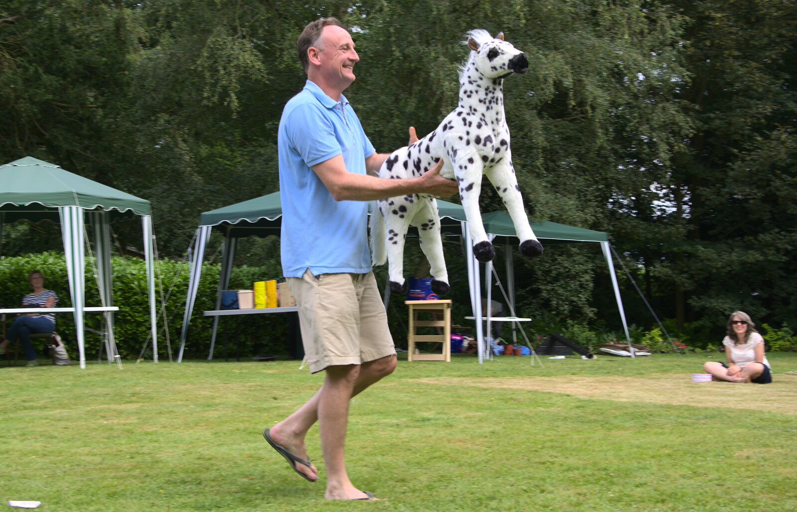 A spotty horse toy is hauled around from The Village Summer Fête, Brome, Suffolk - 5th July 2014